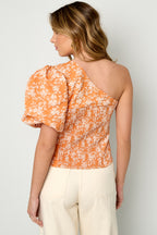 Top a fiori monospalla