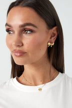 collana con palline e fiocco
