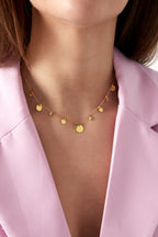 collana con monete colorate pop