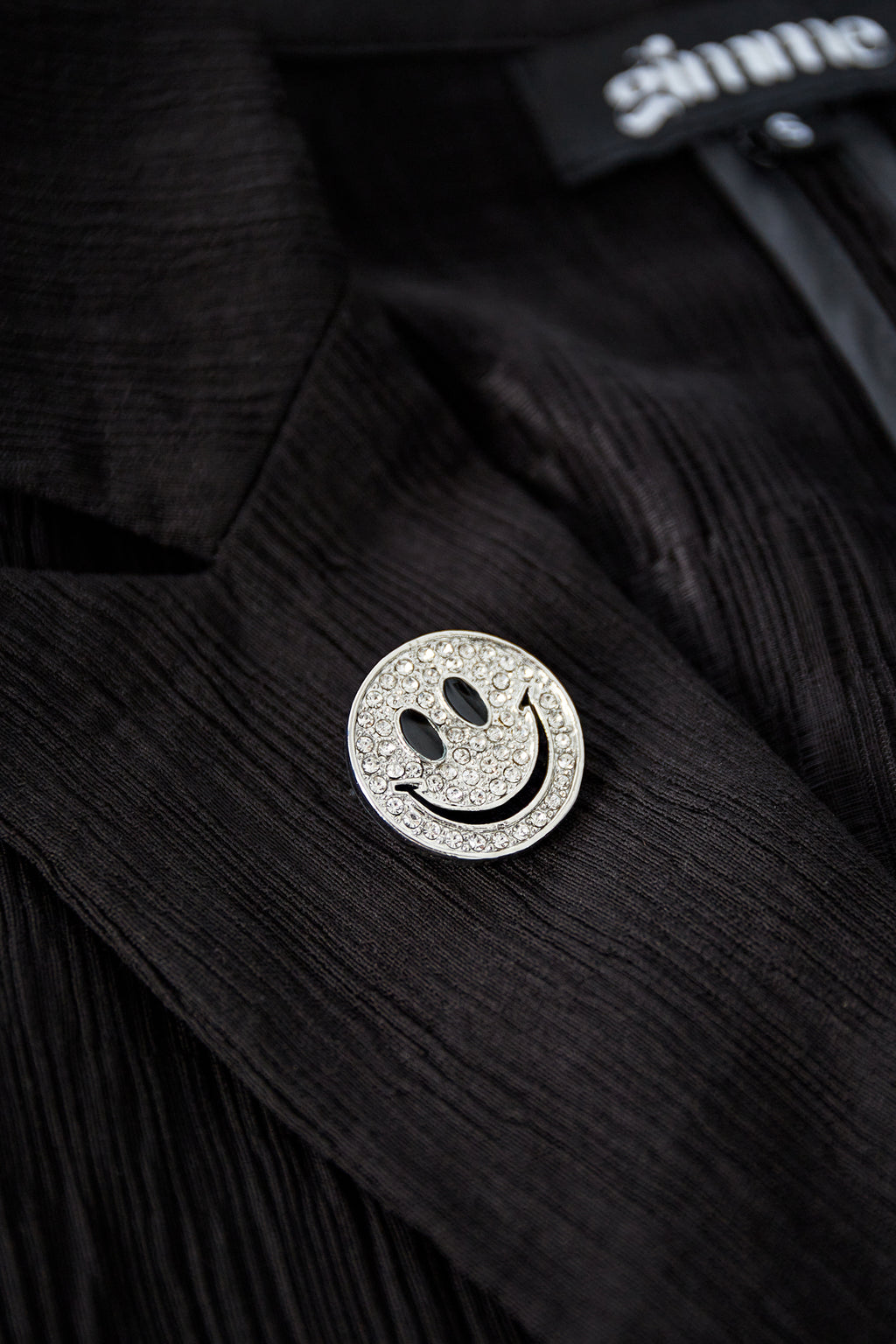 spilla sorriso