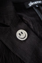 spilla sorriso