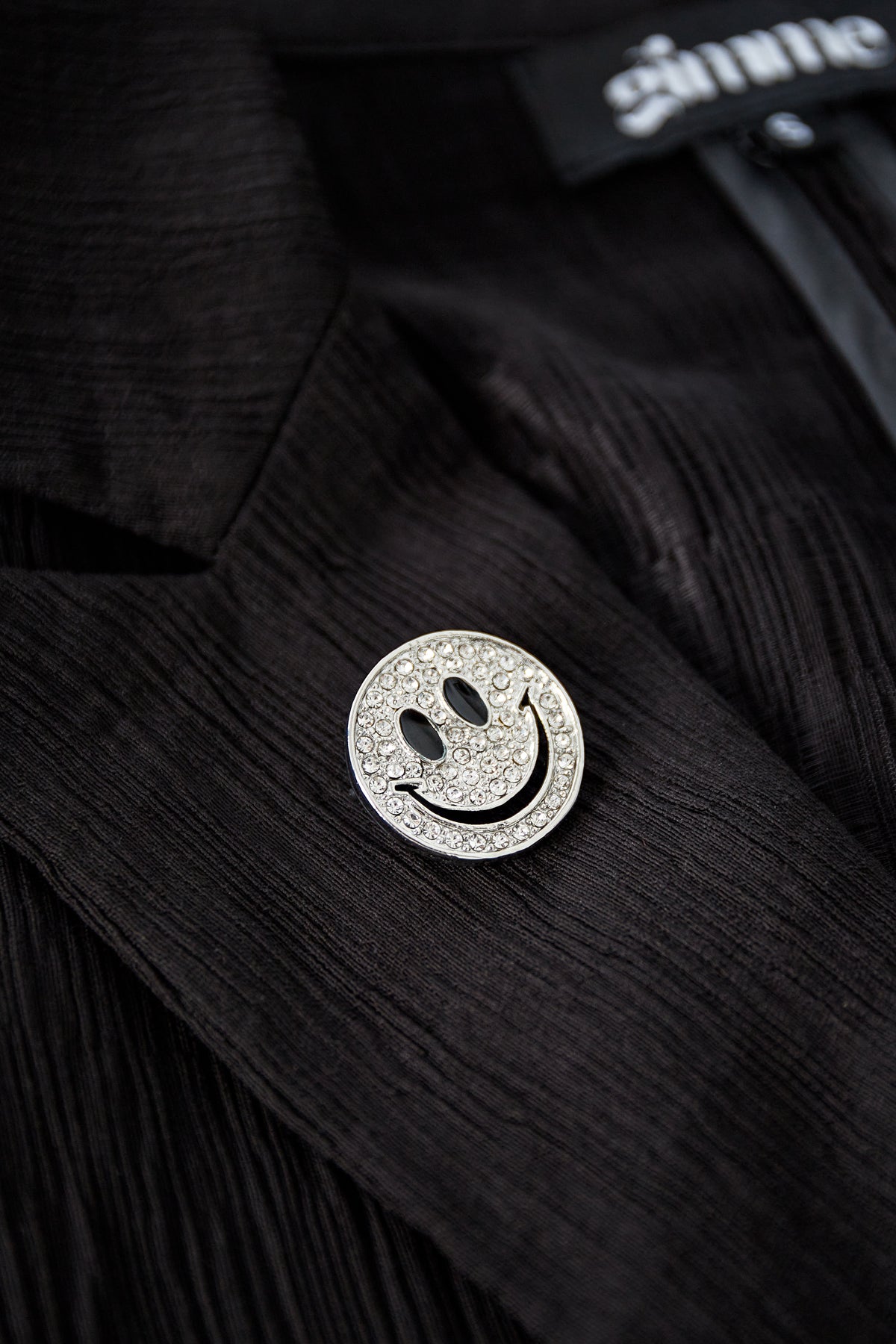 spilla sorriso