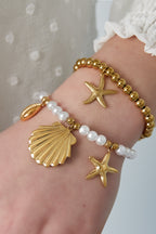bracciale di perle con ciondoli marini