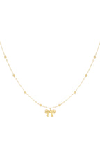 collana con palline e fiocco
