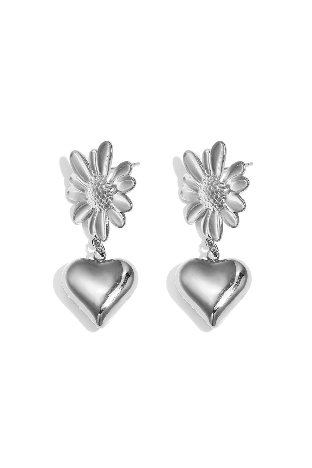 Orecchini a forma di fiore con cuore pendente