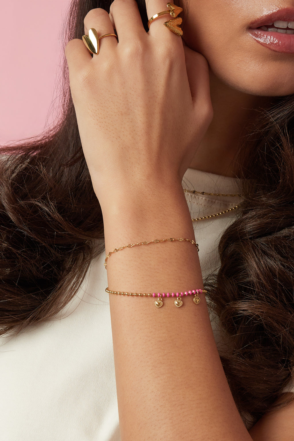 Bracciale doppio con perline e ciondoli a forma di cuore