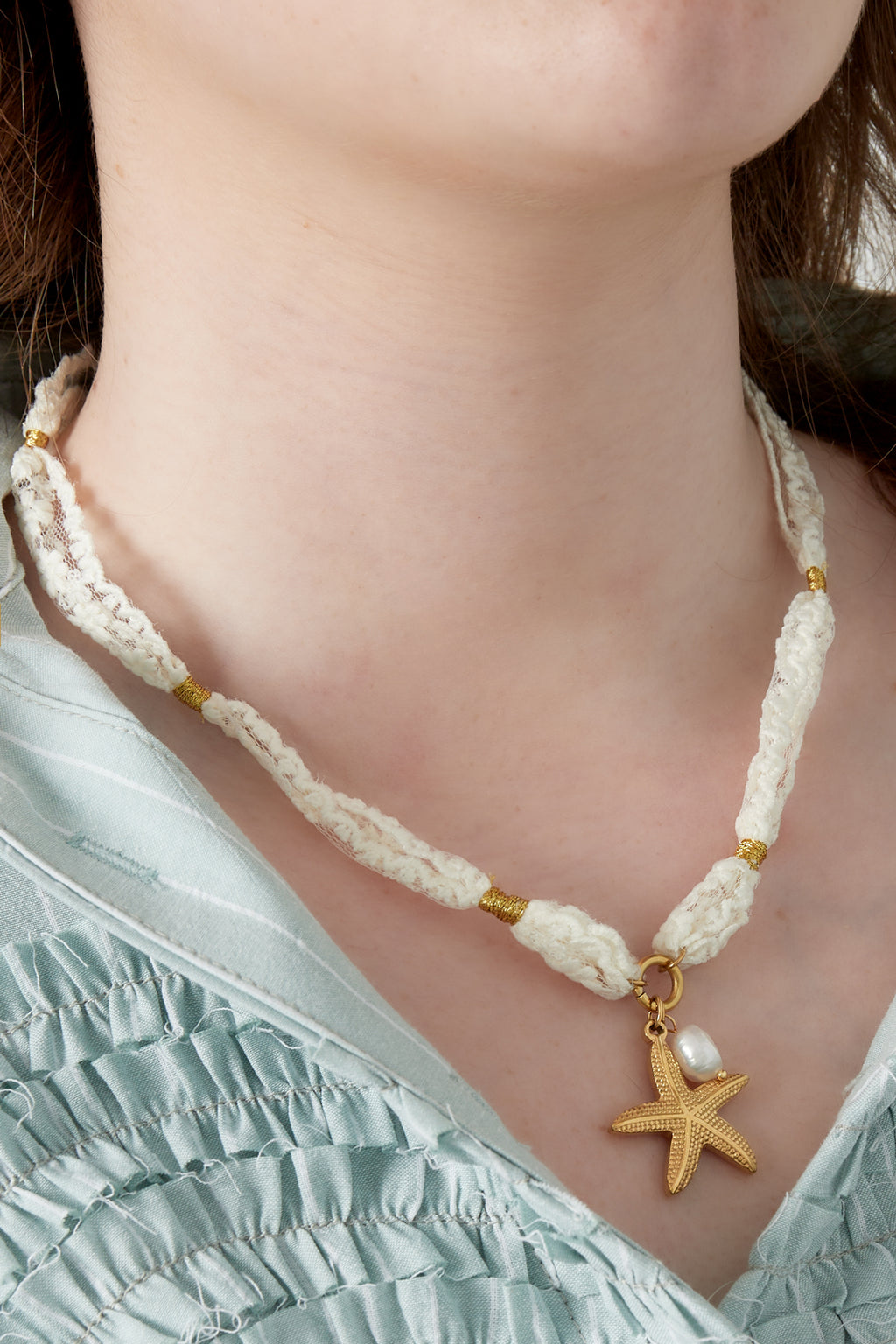 Collana con stella marina e perle