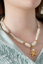 Collana con stella marina e perle