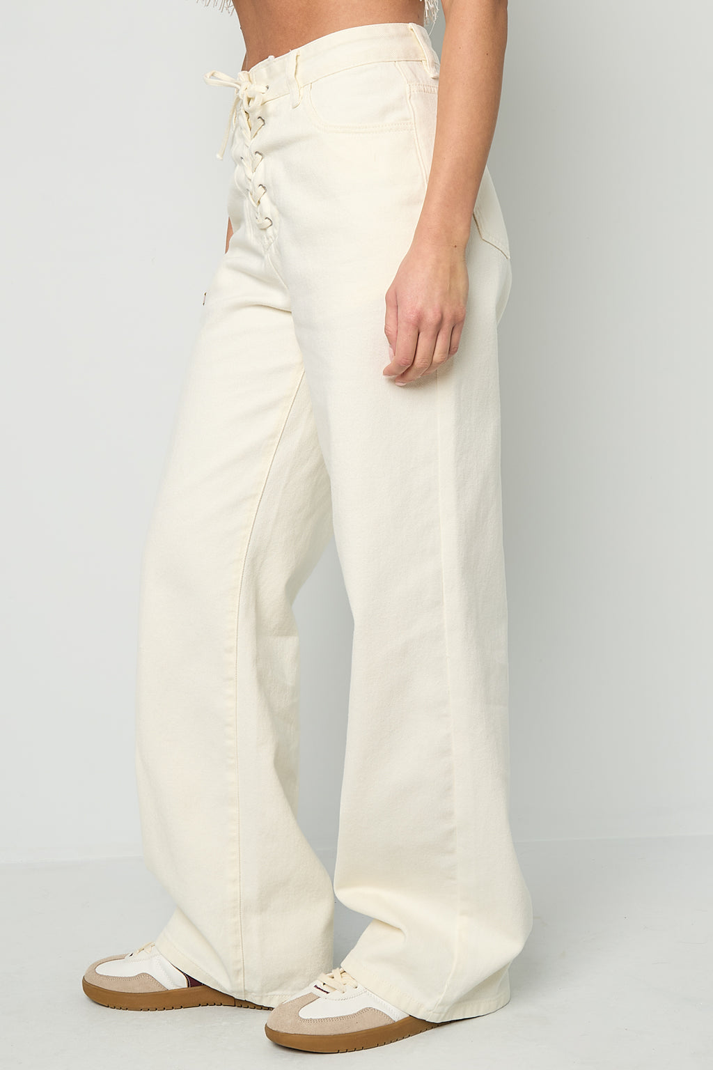 Jeans in denim con lacci