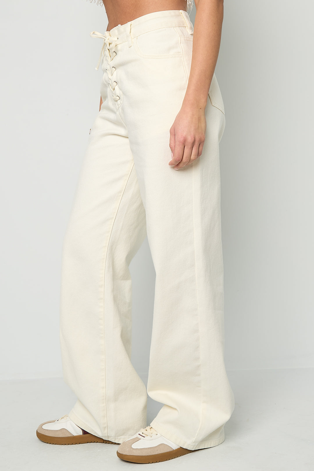 Jeans in denim con lacci