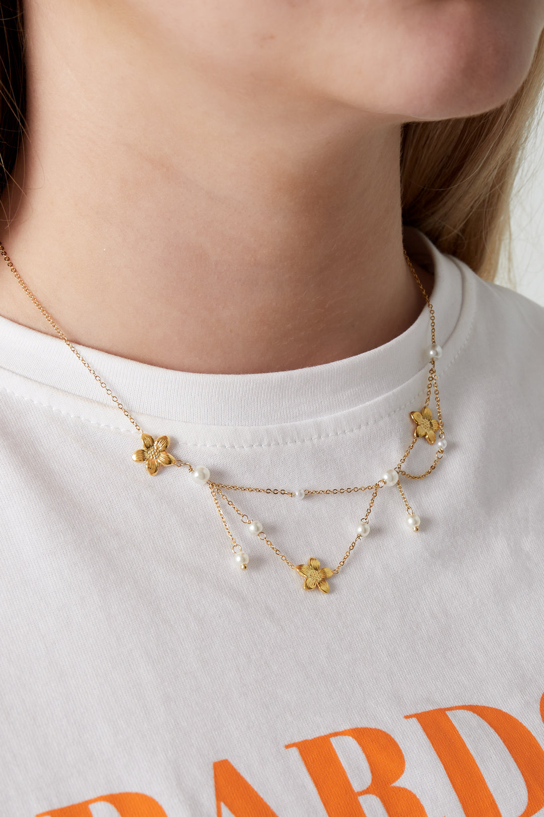 Collana con fiori a doppio problema
