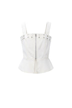 Top in denim con occhielli