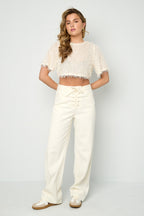 Jeans in denim con lacci