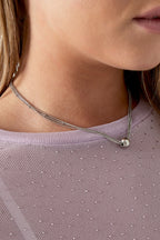 Collana con ciondolo senza tempo