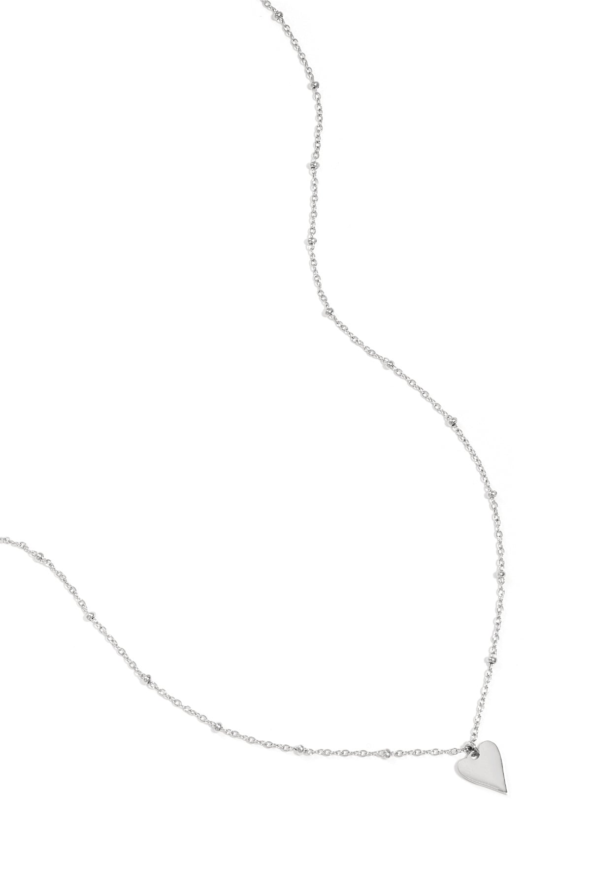 collana con palline e ciondolo a cuore