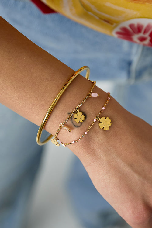 Bracciale con ciondoli a forma di trifoglio e perline
