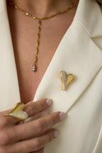 Spilla a forma di cuore con pietre