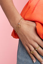 Bracciale con pietre colorate e fiori