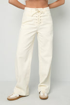 Jeans in denim con lacci