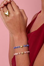 Bracciale di perline con centrotavola a forma di cuore