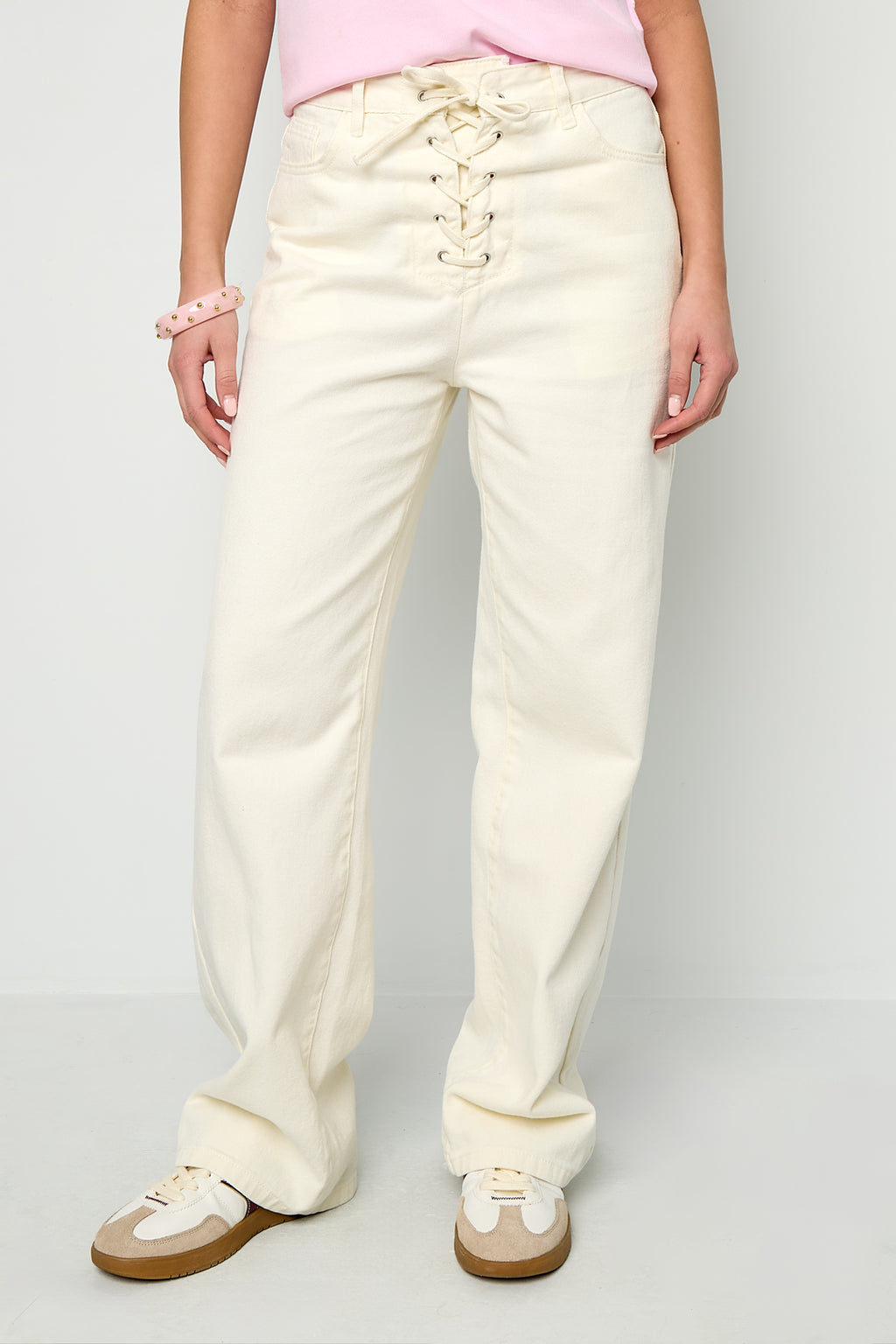 Jeans in denim con lacci